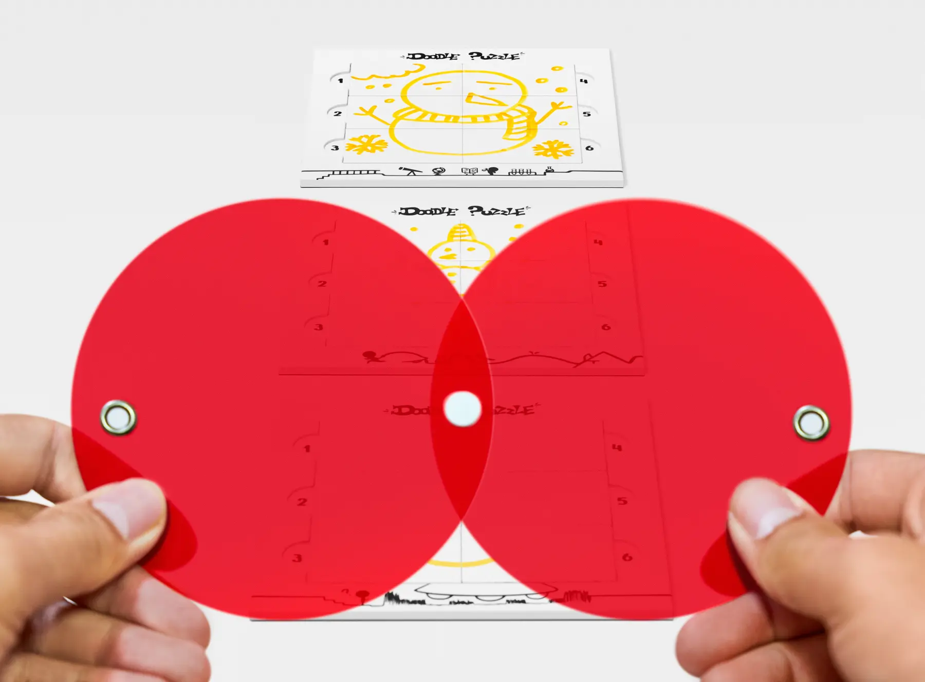 Doodle Puzzle drawing boards, yellow pens and red filter ready for a guessing game